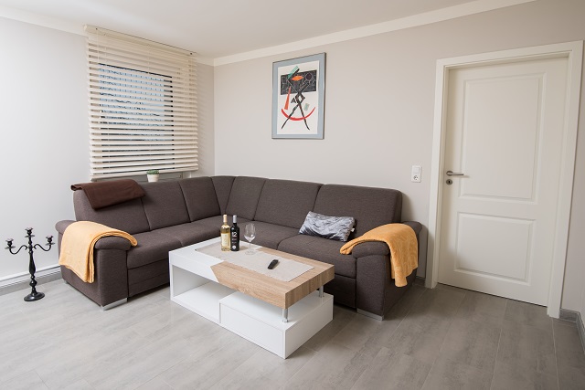 Ferienwohnung Komfort Couple 60: Wohnzimmer - Sitzecke